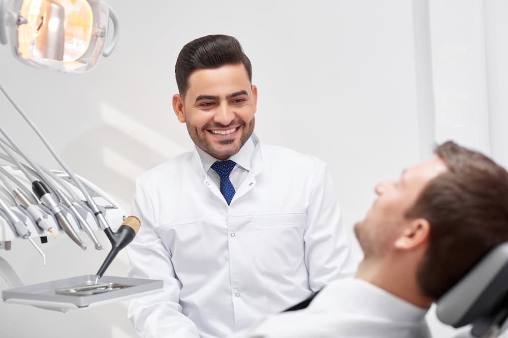 professional-dentist-at-his-clinic-69NWS3W (1)