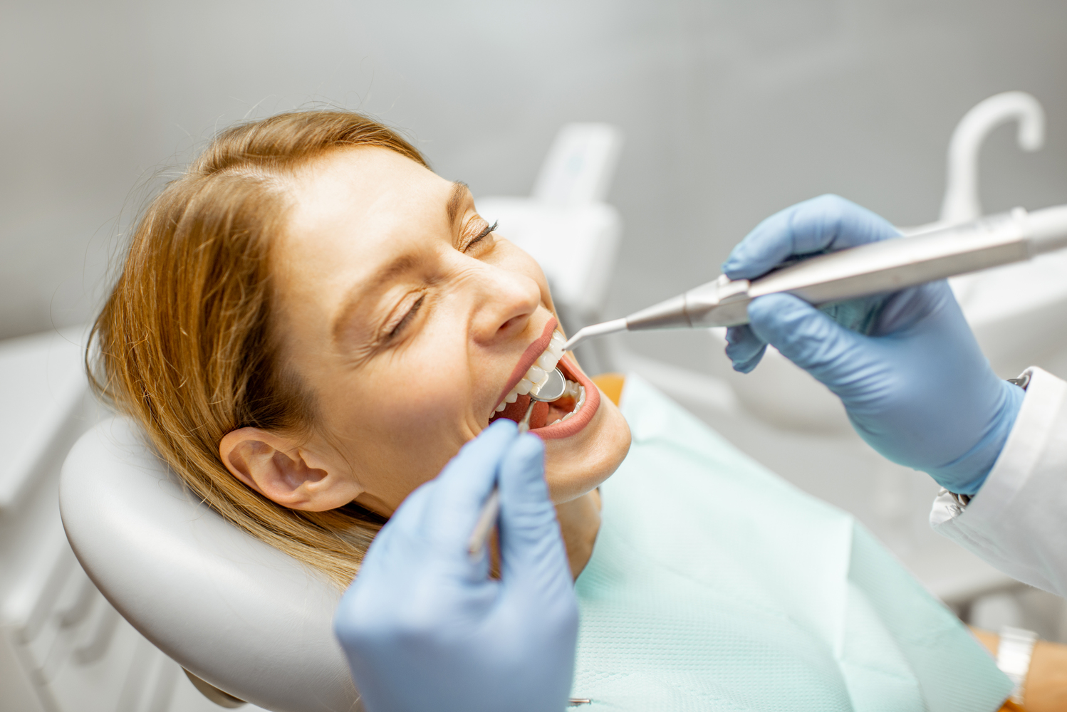 woman during a teeth inspection at the dental offi 2022 01 18 23 45 11 utc 1