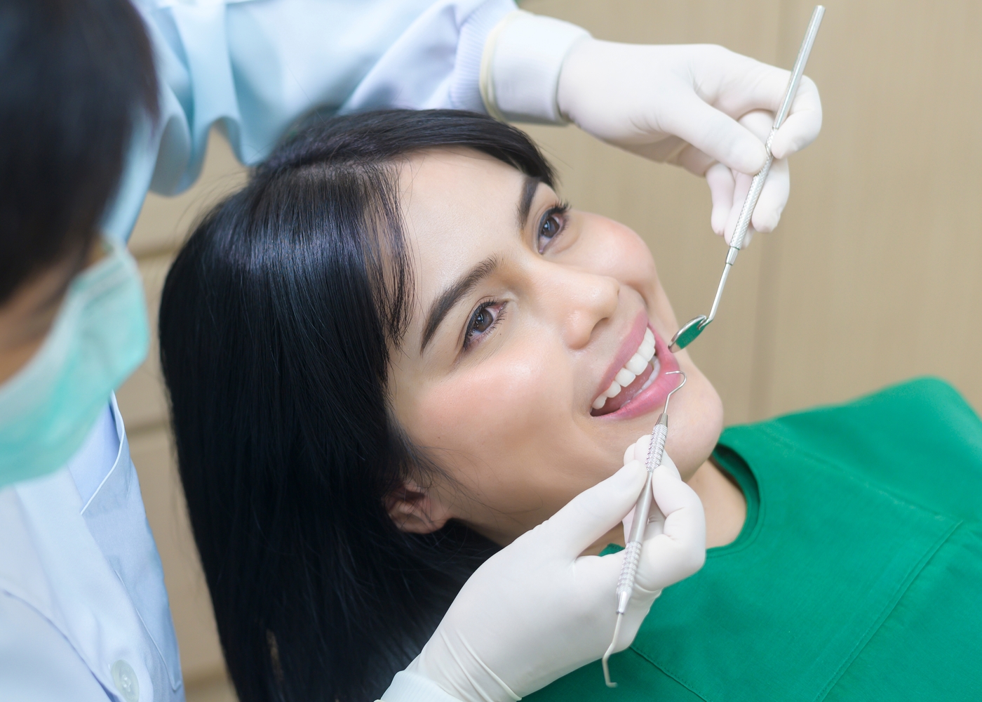 young woman having teeth examined by dentist in de 2023 11 27 05 18 11 utc